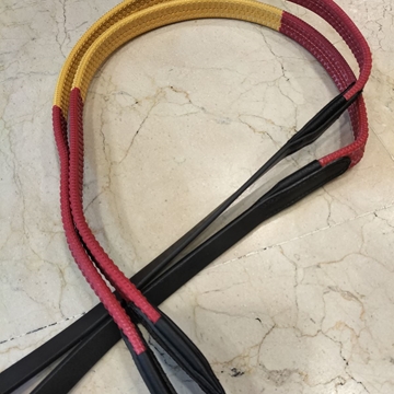 Riendas de goma LEXHIS, cuero color negro y goma rojo/amarillo - Imagen 1